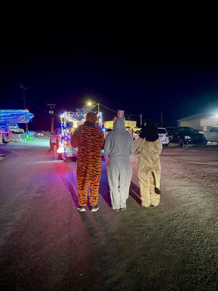 Out of Africa Employees shake their tails at the Camp Verde Holiday Parade